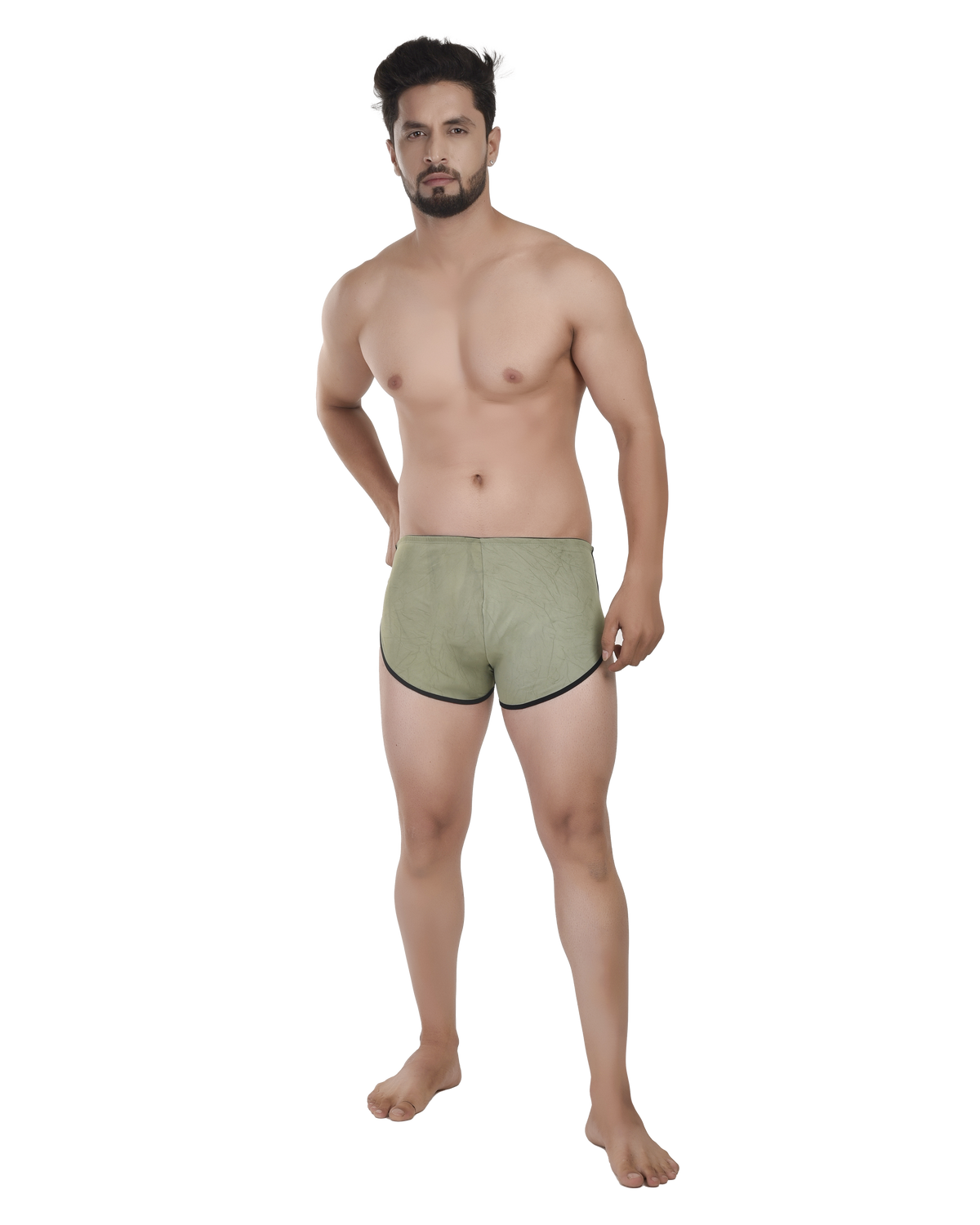 Man wearing green boxer briefs on a white background