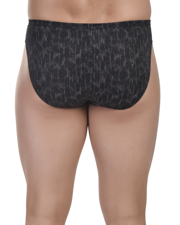Black patterned underwear worn by a person on a white background