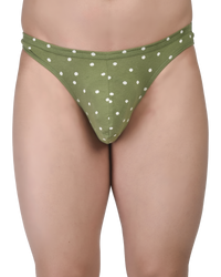 Green polka dot bikini bottom on a white background