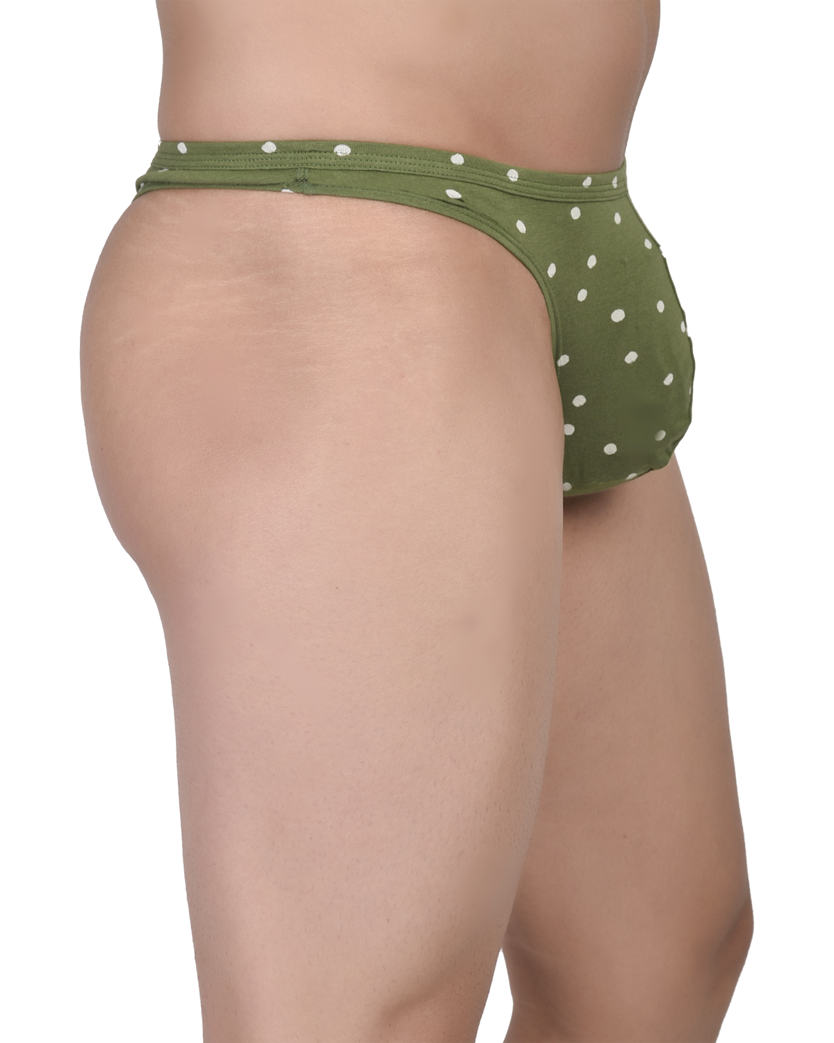 Green polka dot bikini bottom on a white background