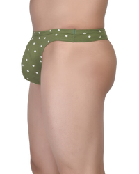 Green polka dot underwear on a white background