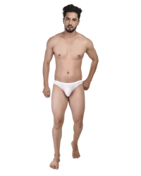 Man wearing a white thong on a white background