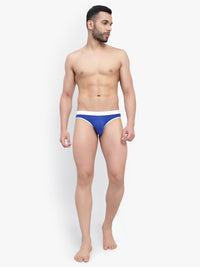 Man wearing blue underwear on a white background